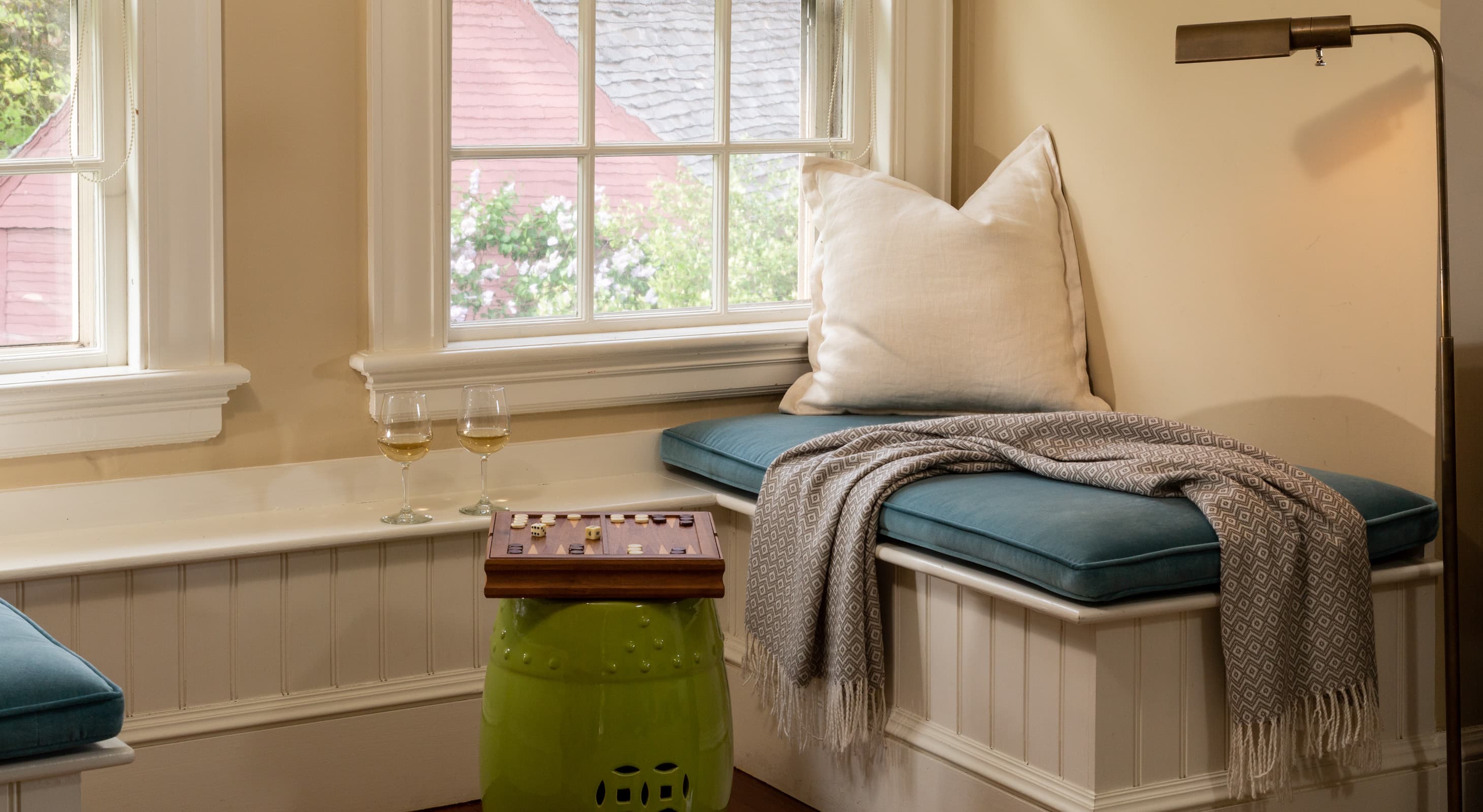 Window seating with wine and leisure games in Ipswich, MA lodging Room