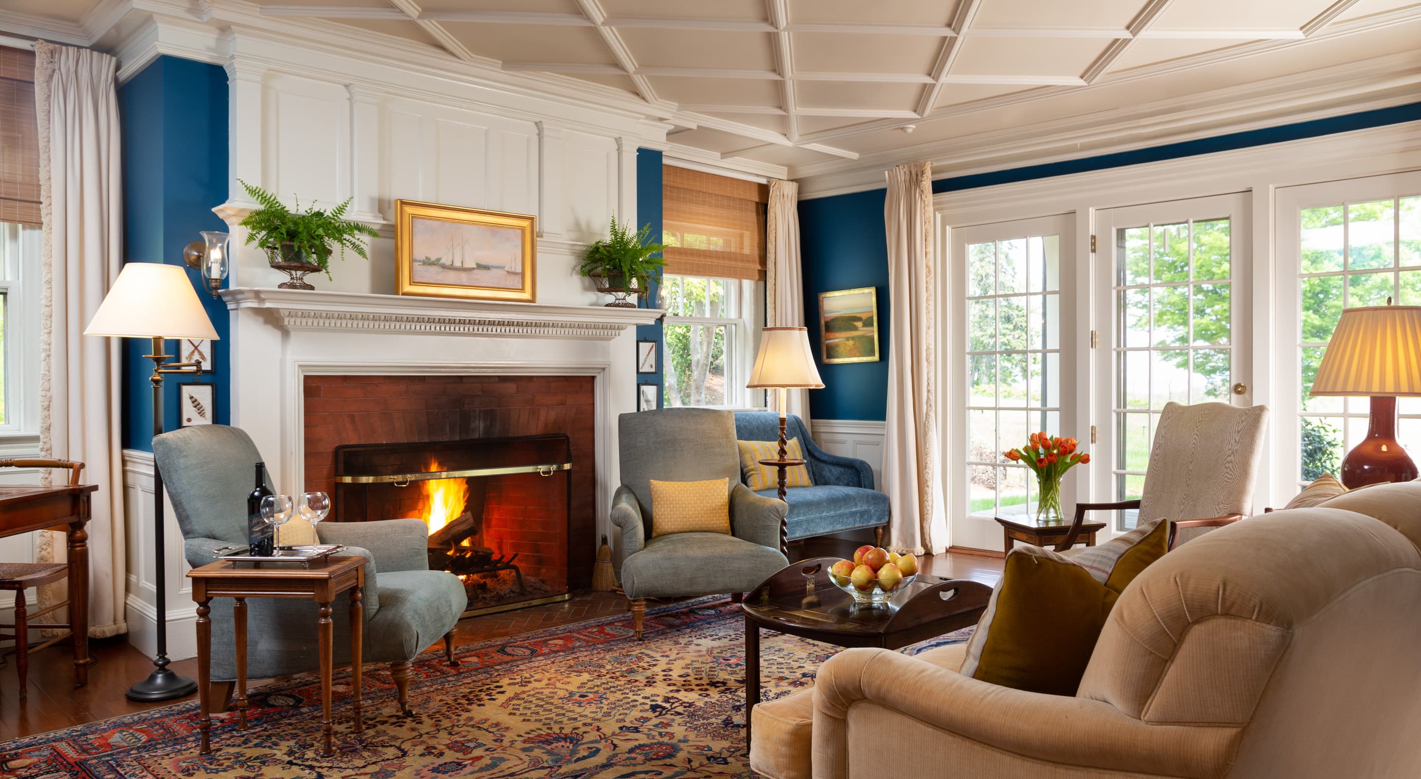 Common area with fireplace at wedding accommodations on the Crane Estate in Ipswich, MA