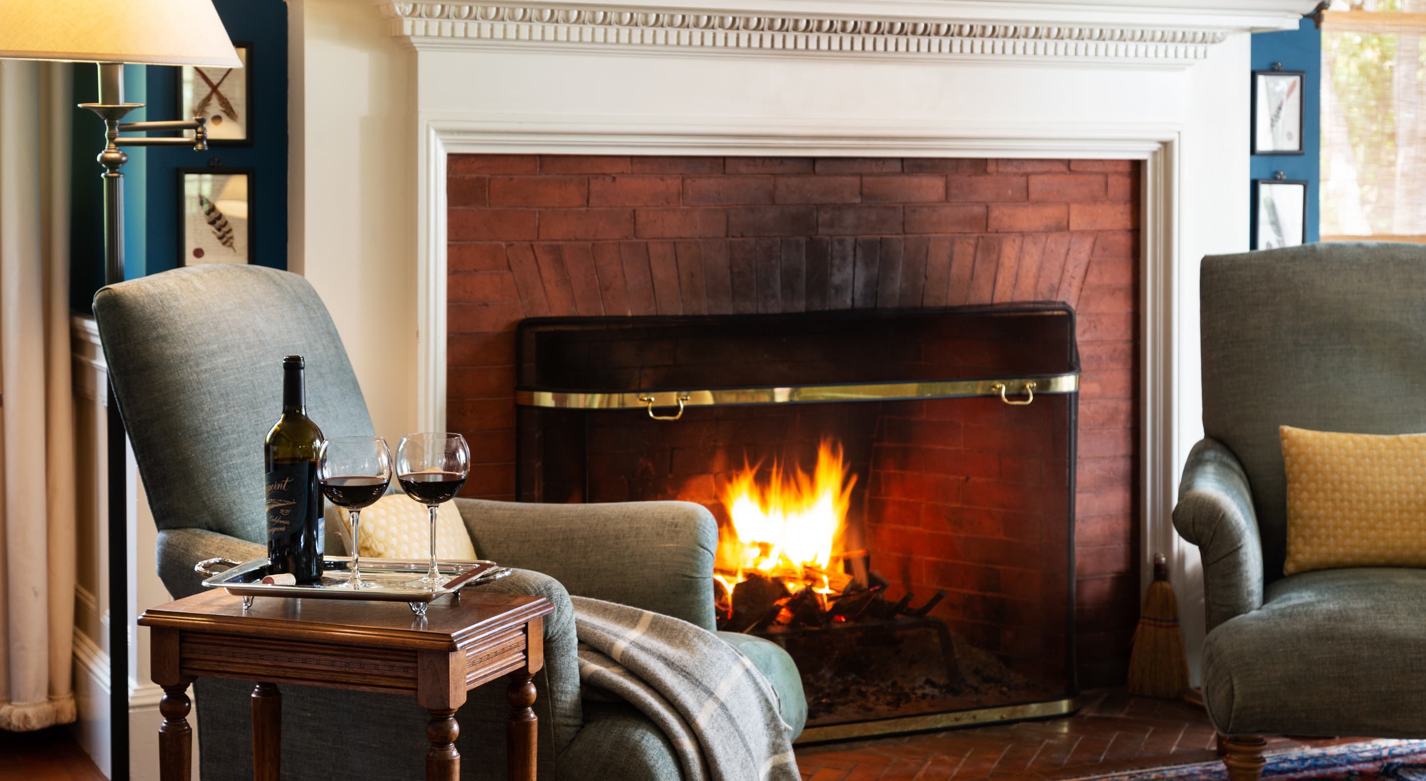 Common area with fireplace at The Inn at Castle Hill