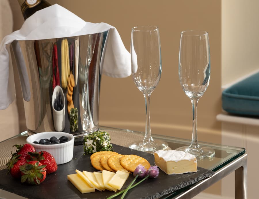 Chilled champagne with fruit and cheese add-on package