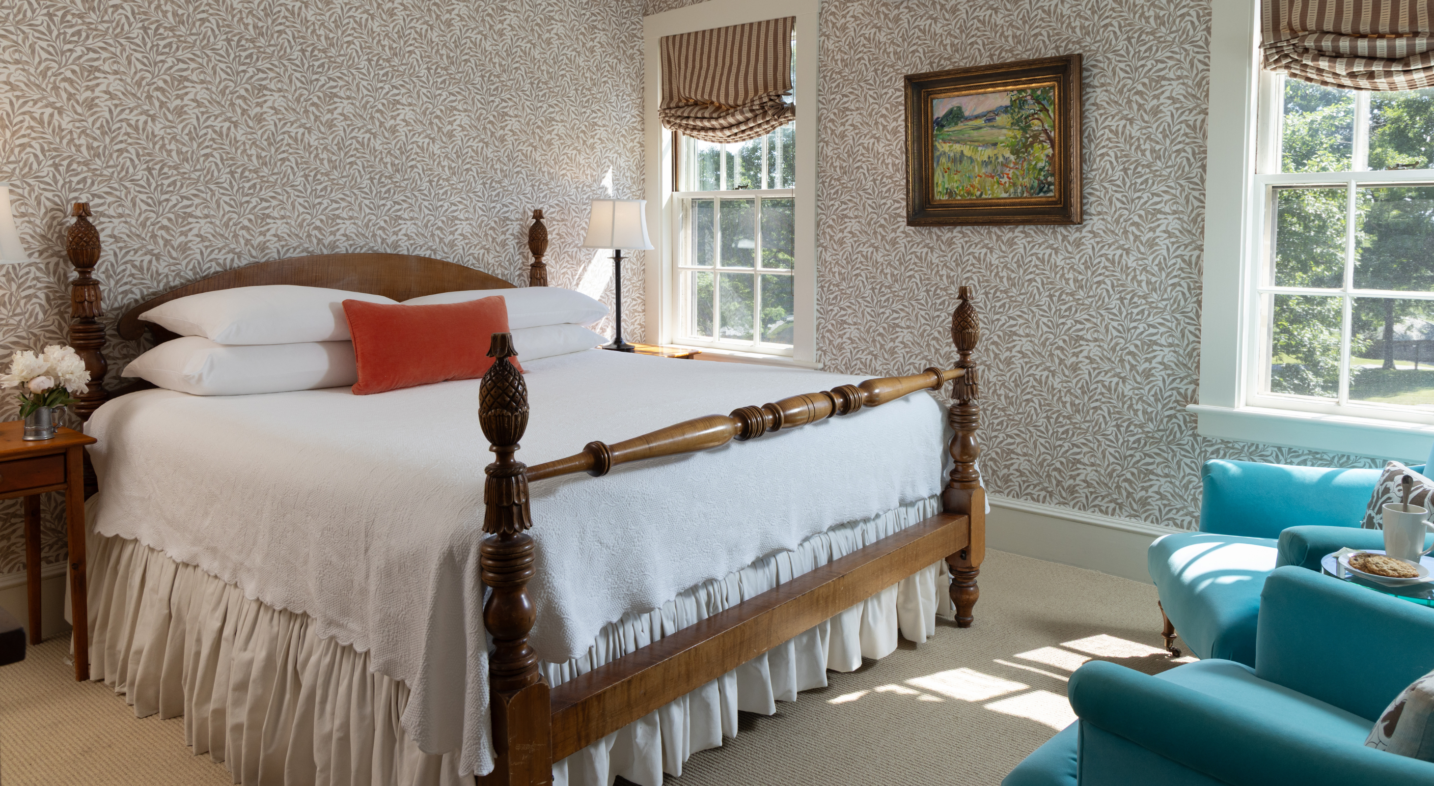 Bed and seating area in Brown Room at Massachusetts boutique hotel