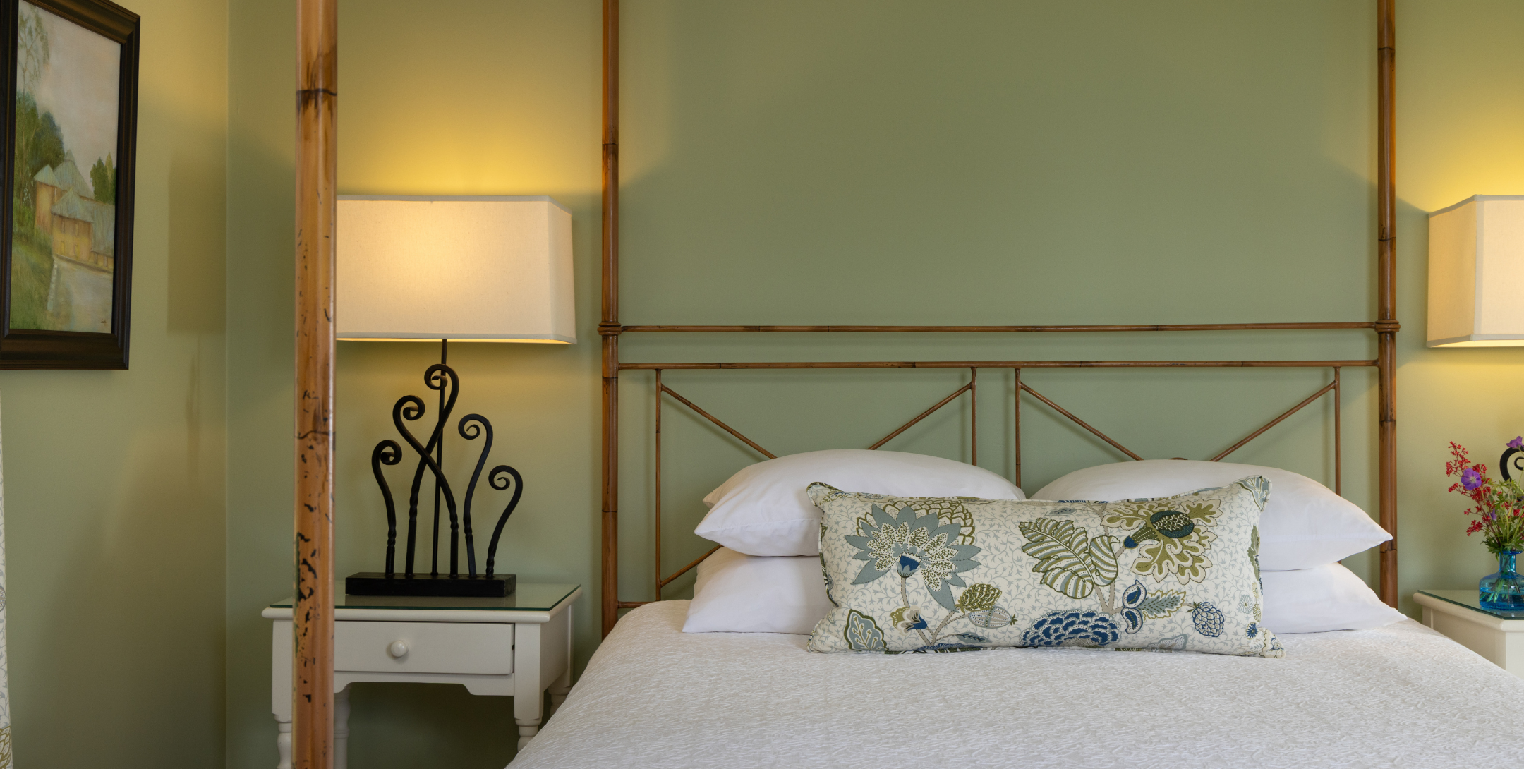 Bed and lilacs in Choate Room at The Inn at Castle Hill