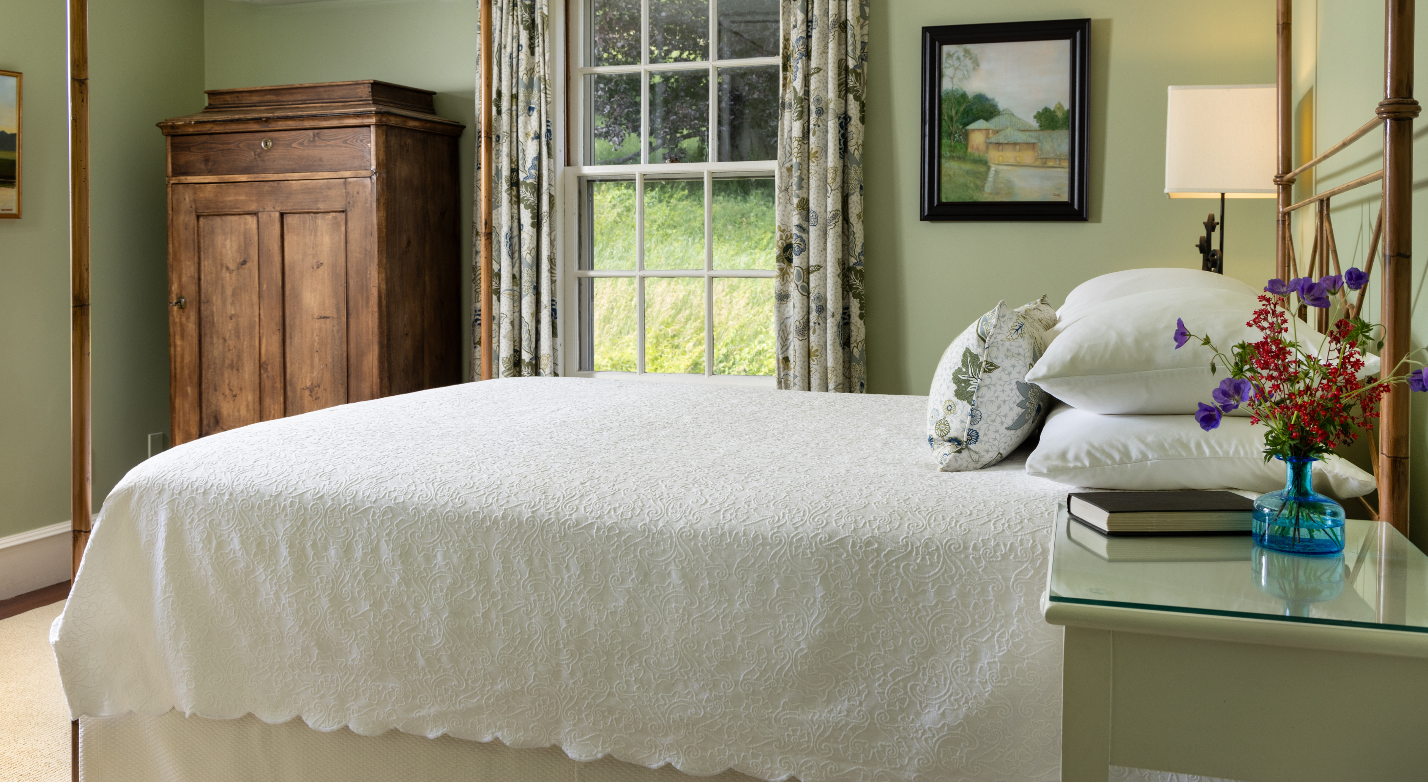 Bed and lilacs in Choate Room offering one of the top places to stay in Massachusetts