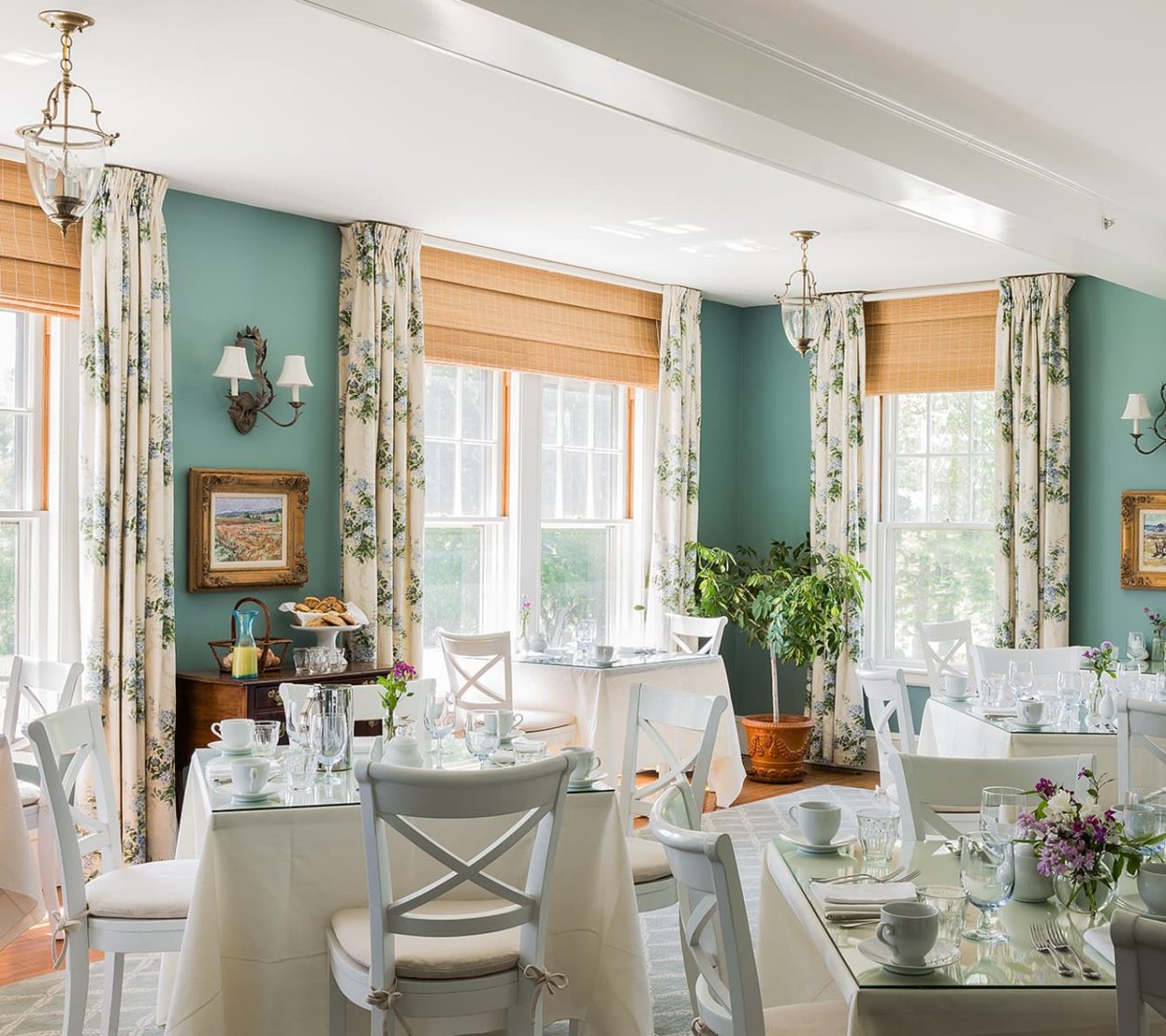 Tables set for gourmet breakfast in the dining room