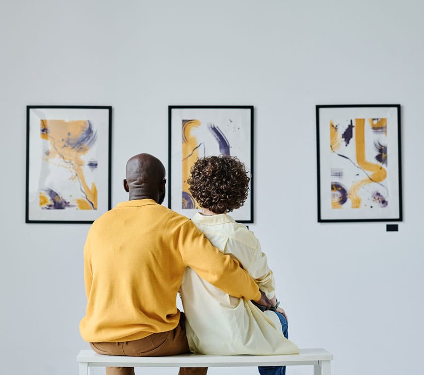 Couple looking at museum artworks